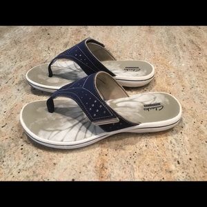 Clark’s flip flops